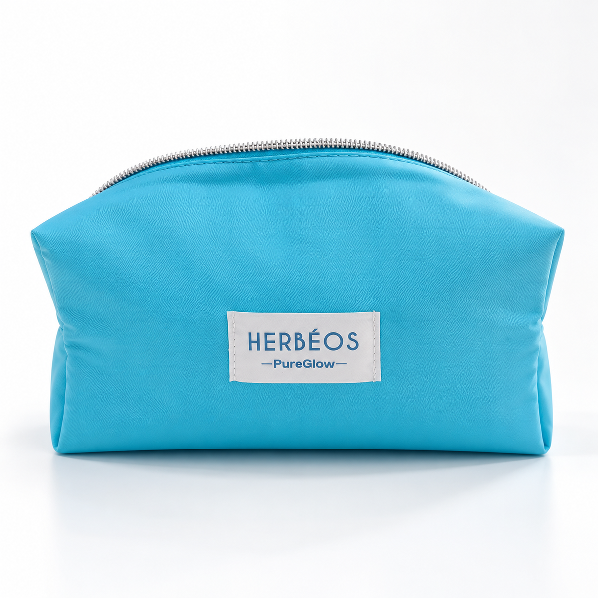 Trousse de toilette bleu turquoise Herbéos Pure Glow avec étiquette blanche