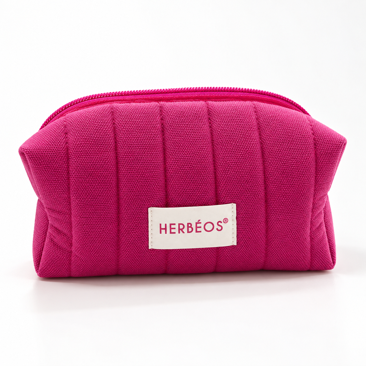 Trousse de toilette matelassée rose fuchsia Herbéos avec étiquette blanche